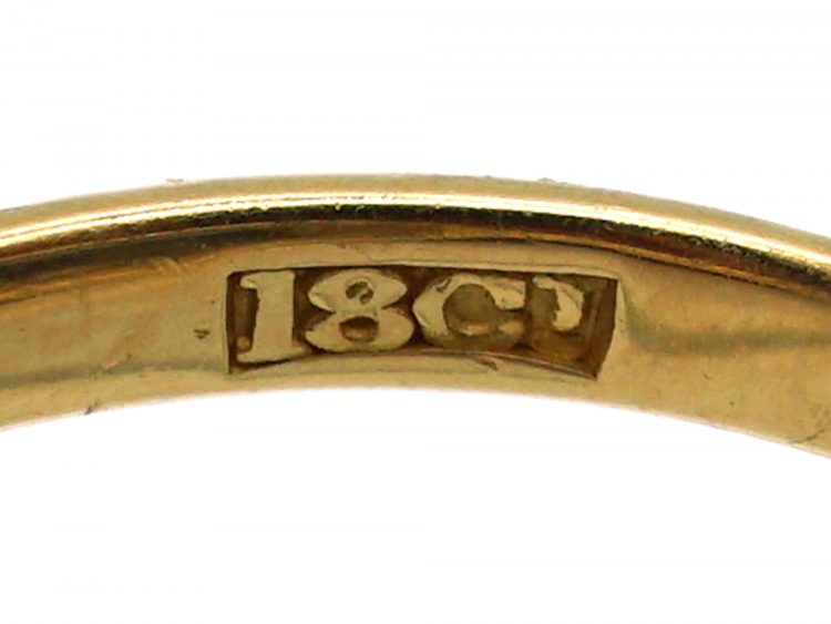 Edwardian 18ct Gold & Platinum Ring set with an Aquamarine with a Diamond Border