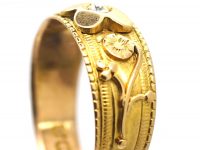 Edwardian 18ct Gold Ring with Flower Motifs and set with a Diamond
