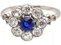 Edwardian Platinum, Sapphire & Diamond Cluster Ring with Ornate Shoulders
