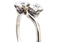 Early 20th Century Platinum, Two Stone Diamond Crossover Ring
