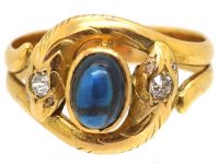 Edwardian 18ct Gold Double Snake Ring set with Diamonds & a Cabochon Sapphire