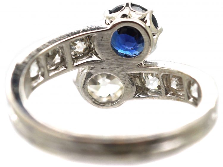French Early 20th Century 18ct White Gold Crossover Ring set with a Sapphire & Diamonds