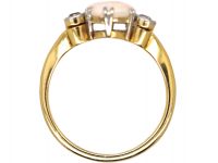 Edwardian 18ct Gold & Platinum Ring set with an Opal with Diamonds on Either Side