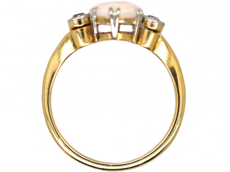Edwardian 18ct Gold & Platinum Ring set with an Opal with Diamonds on Either Side