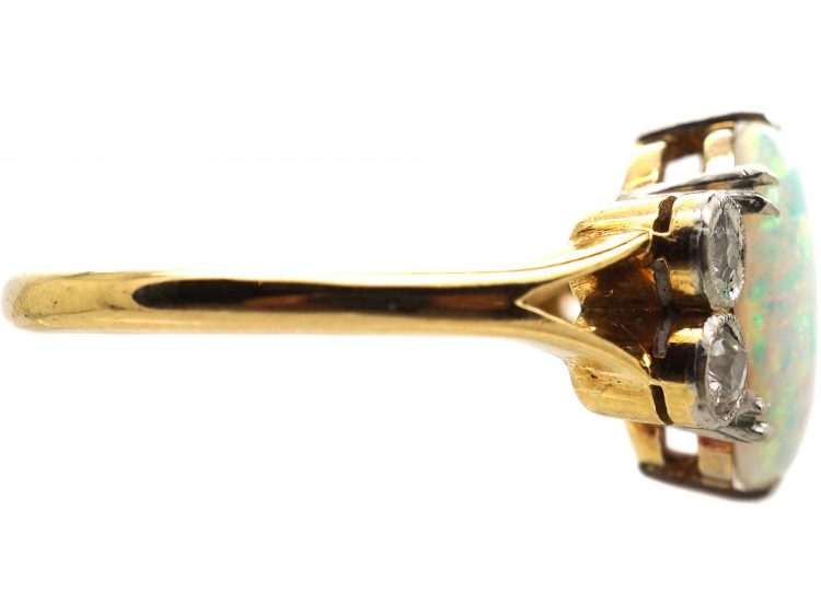 Edwardian 18ct Gold & Platinum Ring set with an Opal with Diamonds on Either Side