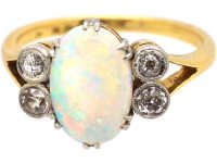 Edwardian 18ct Gold & Platinum Ring set with an Opal with Diamonds on Either Side