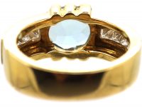 18ct Gold Modernist Ring set with an Aquamarine with Princess Cut Diamond Shoulders