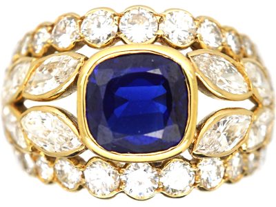 1970s 18ct Gold Wide Dress Ring set with a Sapphire & Marquise & Round Diamonds