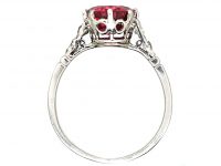 Early 20th Century Platinum, Red Spinel Solitaire Ring with Diamond set Shoulders