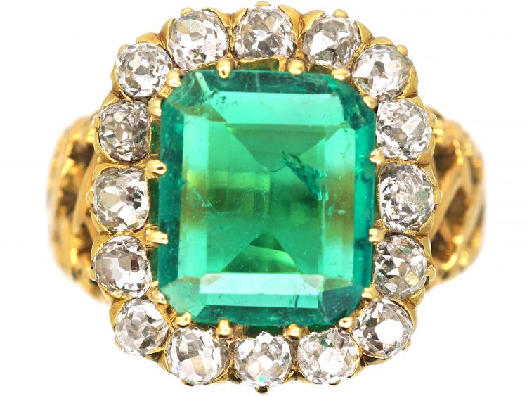 French Import 19th Century 18ct Gold Ring set with a Large Emerald surrounded by Diamonds