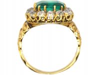French Import 19th Century 18ct Gold Ring set with a Large Emerald surrounded by Diamonds