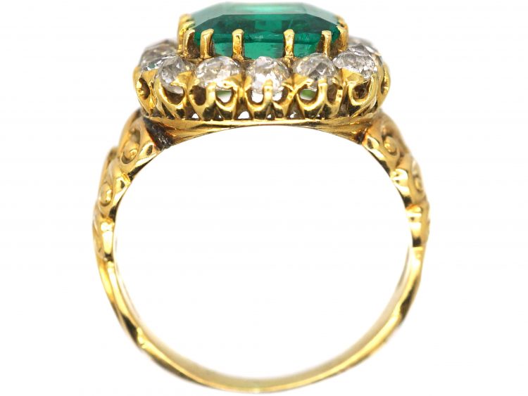 French Import 19th Century 18ct Gold Ring set with a Large Emerald surrounded by Diamonds