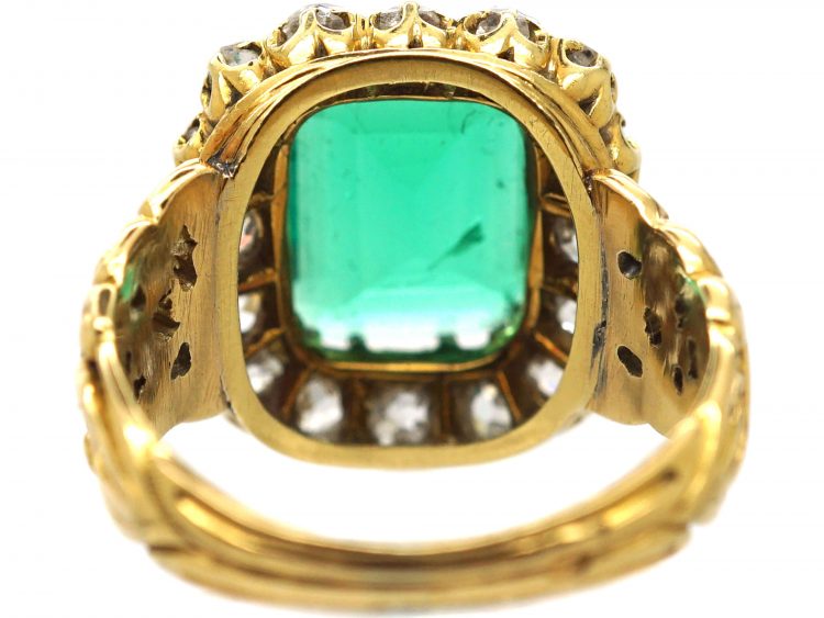 French Import 19th Century 18ct Gold Ring set with a Large Emerald surrounded by Diamonds
