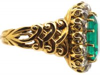 French Import 19th Century 18ct Gold Ring set with a Large Emerald surrounded by Diamonds