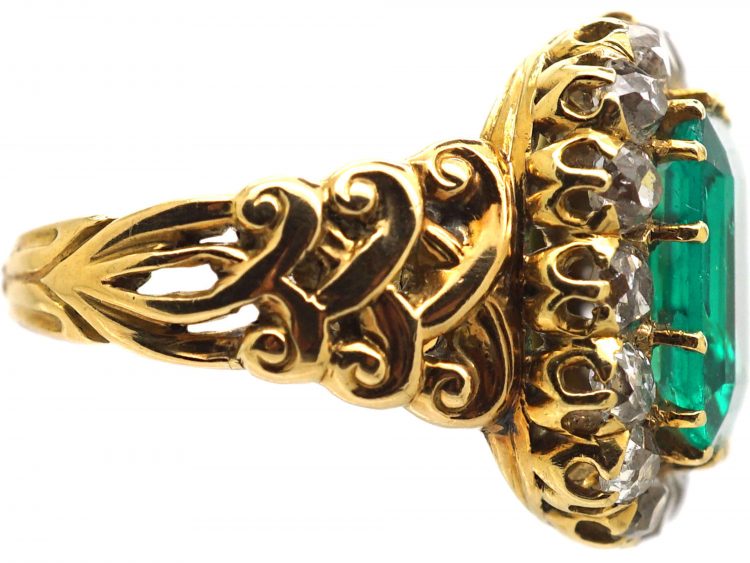 French Import 19th Century 18ct Gold Ring set with a Large Emerald surrounded by Diamonds