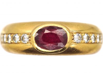 Modernist 18ct Gold Ring set with a Ruby and Diamond Shoulders