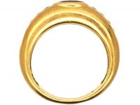 Modernist 18ct Gold Ring set with a Ruby and Diamond Shoulders