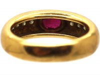 Modernist 18ct Gold Ring set with a Ruby and Diamond Shoulders
