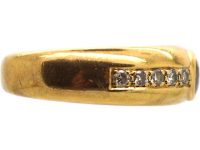 Modernist 18ct Gold Ring set with a Ruby and Diamond Shoulders