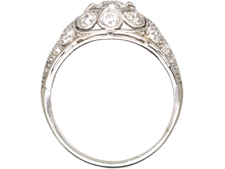 Early 20th Century Platinum, Diamond Cluster Ring with Diamond Set Shoulders