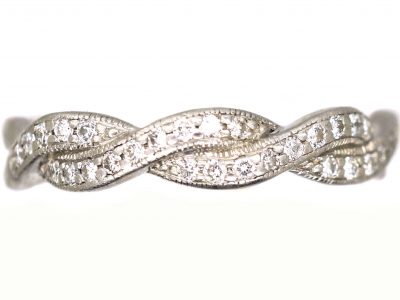 Early 20th Century Platinum Ribbon Design Ring set with Diamonds