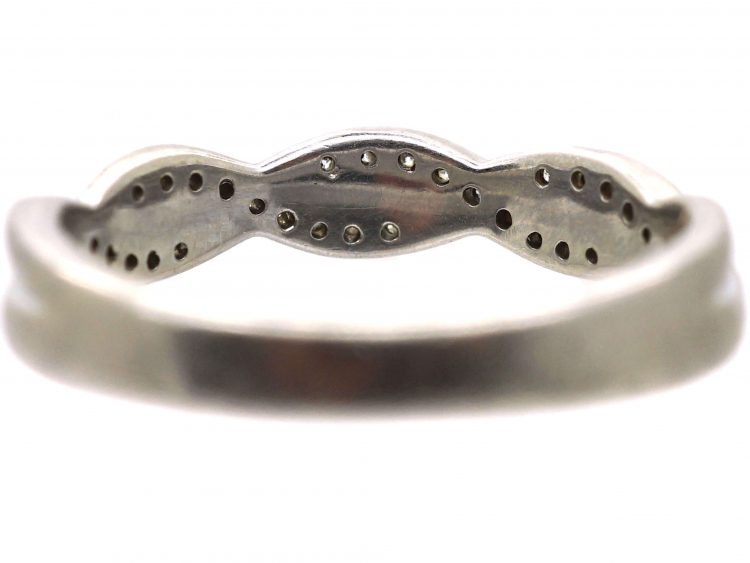Early 20th Century Platinum Ribbon Design Ring set with Diamonds