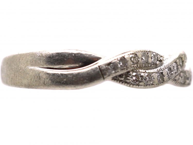 Early 20th Century Platinum Ribbon Design Ring set with Diamonds