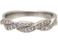 Early 20th Century Platinum Ribbon Design Ring set with Diamonds