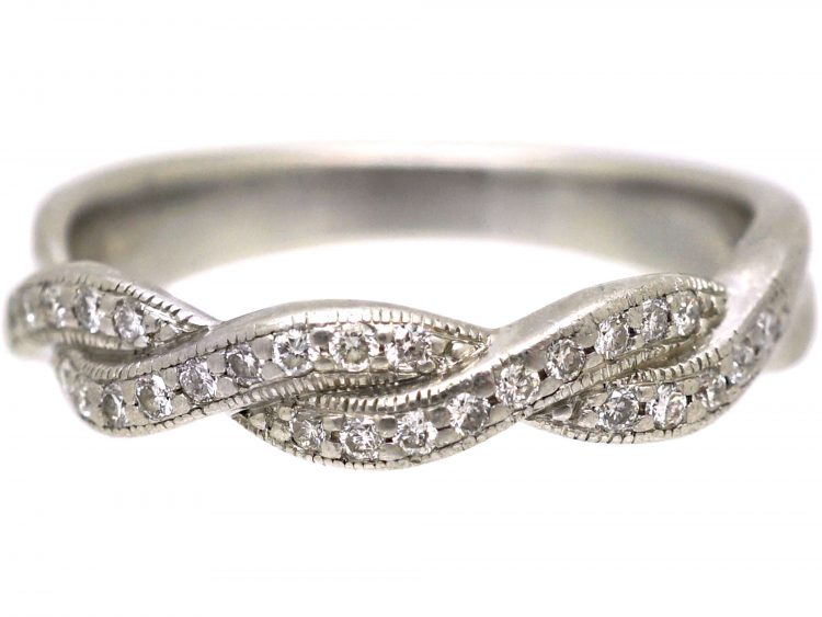 Early 20th Century Platinum Ribbon Design Ring set with Diamonds