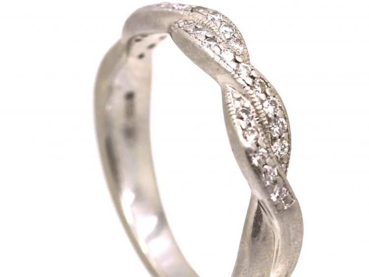 Early 20th Century Platinum Ribbon Design Ring set with Diamonds
