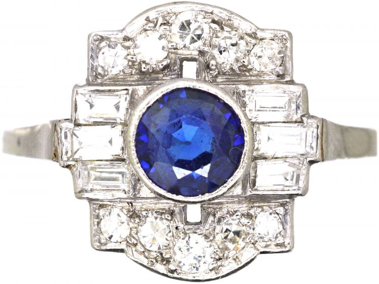 Art Deco Platinum Ring set with a Sapphire & Round & Baguette Cut Diamonds