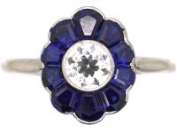 Art Deco Platinum, Flower Ring set with a Diamond with Sapphire Petals