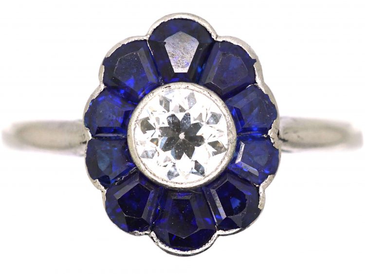 Art Deco Platinum, Flower Ring set with a Diamond with Sapphire Petals
