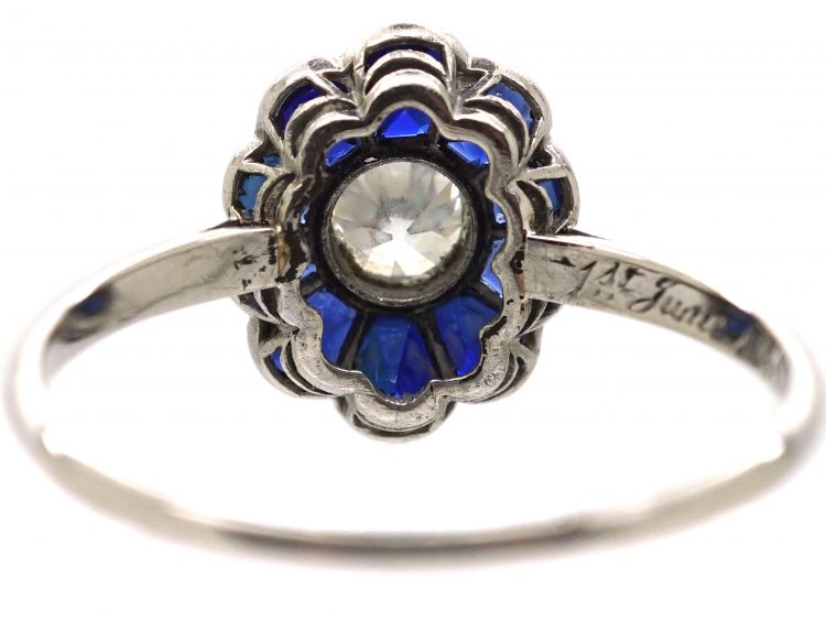 Art Deco Platinum, Flower Ring set with a Diamond with Sapphire Petals
