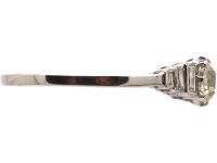 Art Deco Platinum Diamond Solitaire Ring with Step Cut Shoulders set with Baguette Diamonds