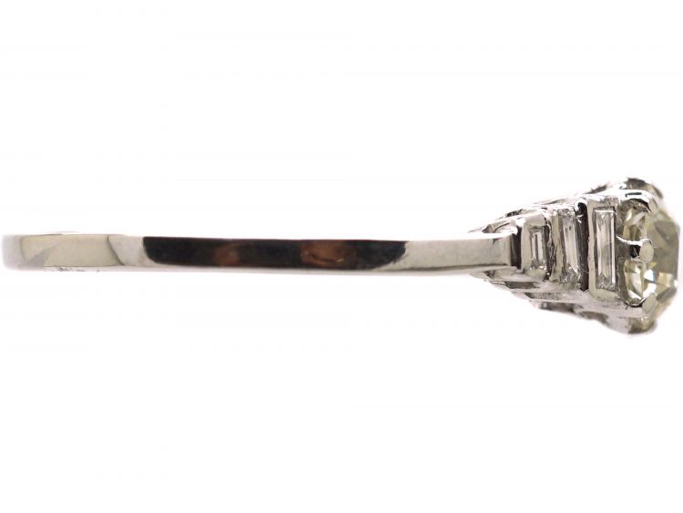 Art Deco Platinum Diamond Solitaire Ring with Step Cut Shoulders set with Baguette Diamonds