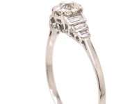 Art Deco Platinum Diamond Solitaire Ring with Step Cut Shoulders set with Baguette Diamonds
