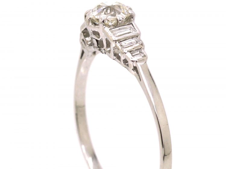 Art Deco Platinum Diamond Solitaire Ring with Step Cut Shoulders set with Baguette Diamonds