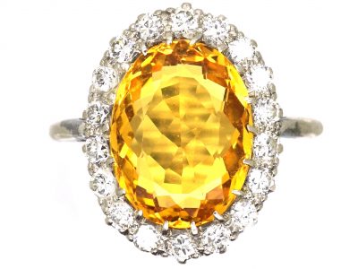 Early 20th Century Platinum Yellow Sapphire & Diamond Oval Cluster Ring