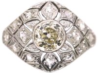 Art Deco Platinum Pierced Bombè Cluster Ring set with a Pale Yellow Diamond & Rose Diamonds