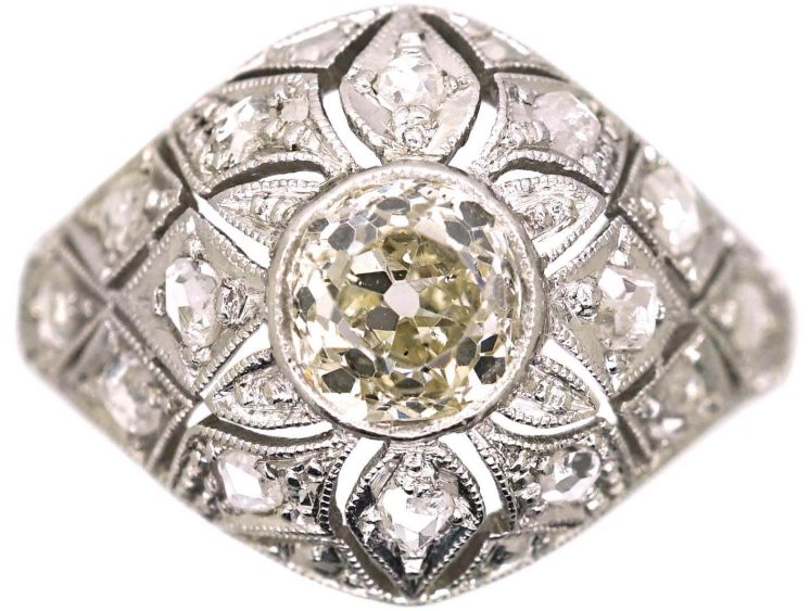 Art Deco Platinum Pierced Bombè Cluster Ring set with a Pale Yellow Diamond & Rose Diamonds