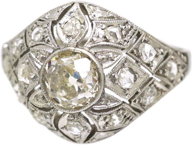 Art Deco Platinum Pierced Bombè Cluster Ring set with a Pale Yellow Diamond & Rose Diamonds