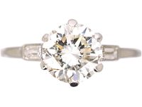 Platinum Solitaire Diamond Ring with Baguette Diamond Shoulders