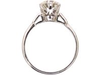 Platinum Solitaire Diamond Ring with Baguette Diamond Shoulders