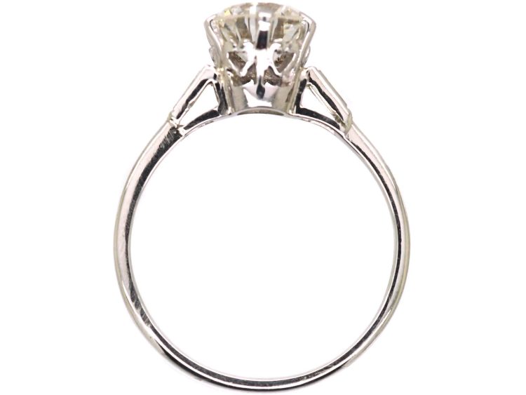 Platinum Solitaire Diamond Ring with Baguette Diamond Shoulders