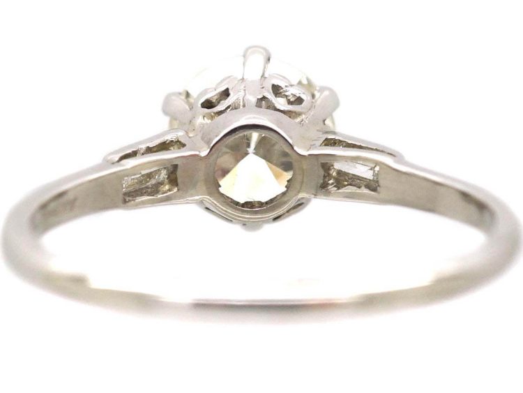 Platinum Solitaire Diamond Ring with Baguette Diamond Shoulders