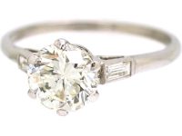 Platinum Solitaire Diamond Ring with Baguette Diamond Shoulders