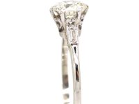 Platinum Solitaire Diamond Ring with Baguette Diamond Shoulders