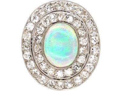 Early 20th Century Large Platinum Cluster Ring set with an Opal & Diamonds