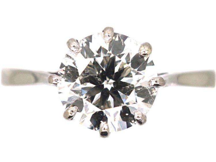 Early 20th Century Platinum Solitaire Ring set with a 1.55 Carat Diamond